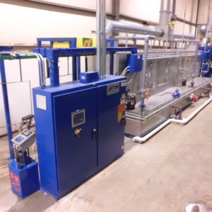 Monorail parts washer